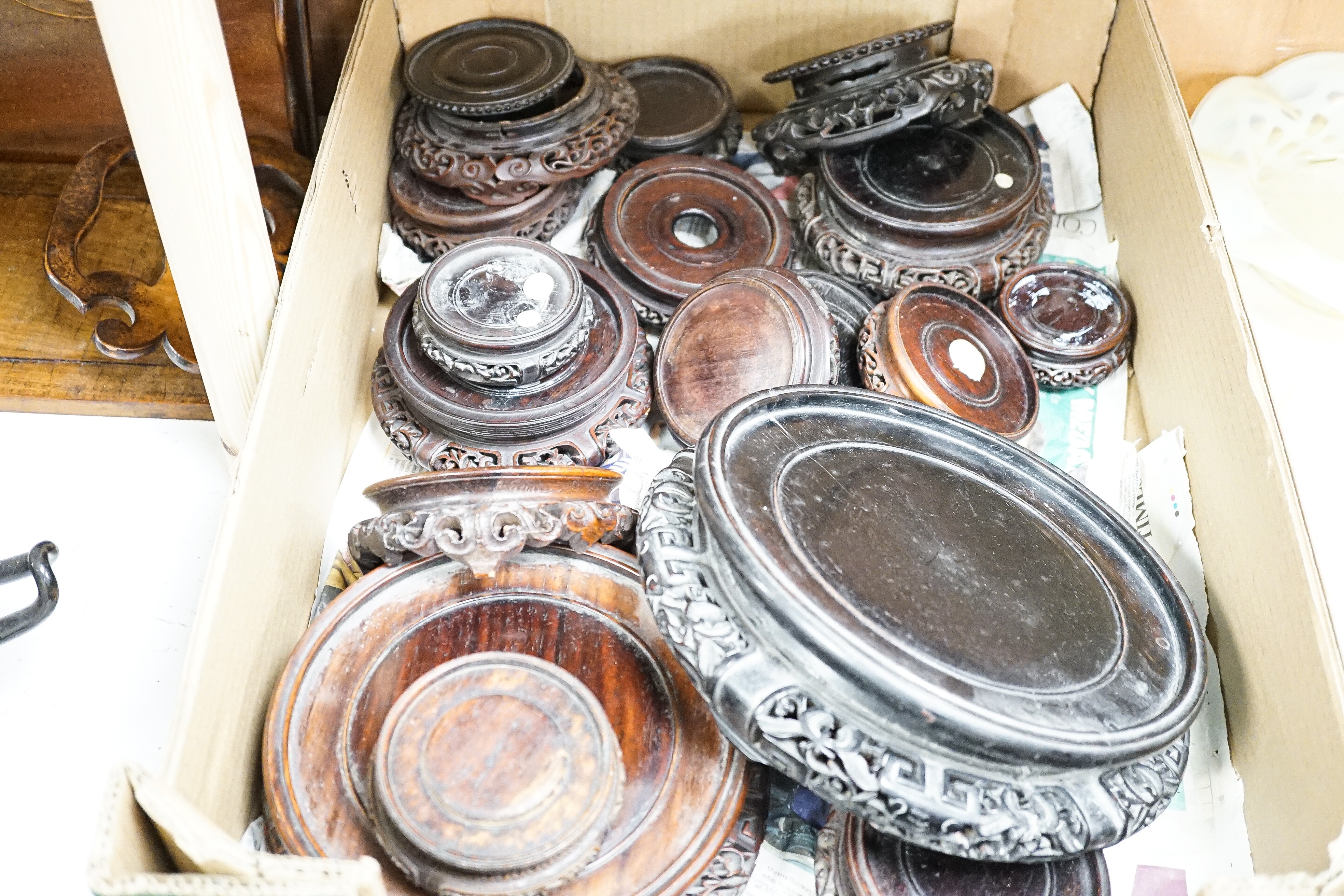 A collection of Chinese hardwood stands, largest 23. 5 cm